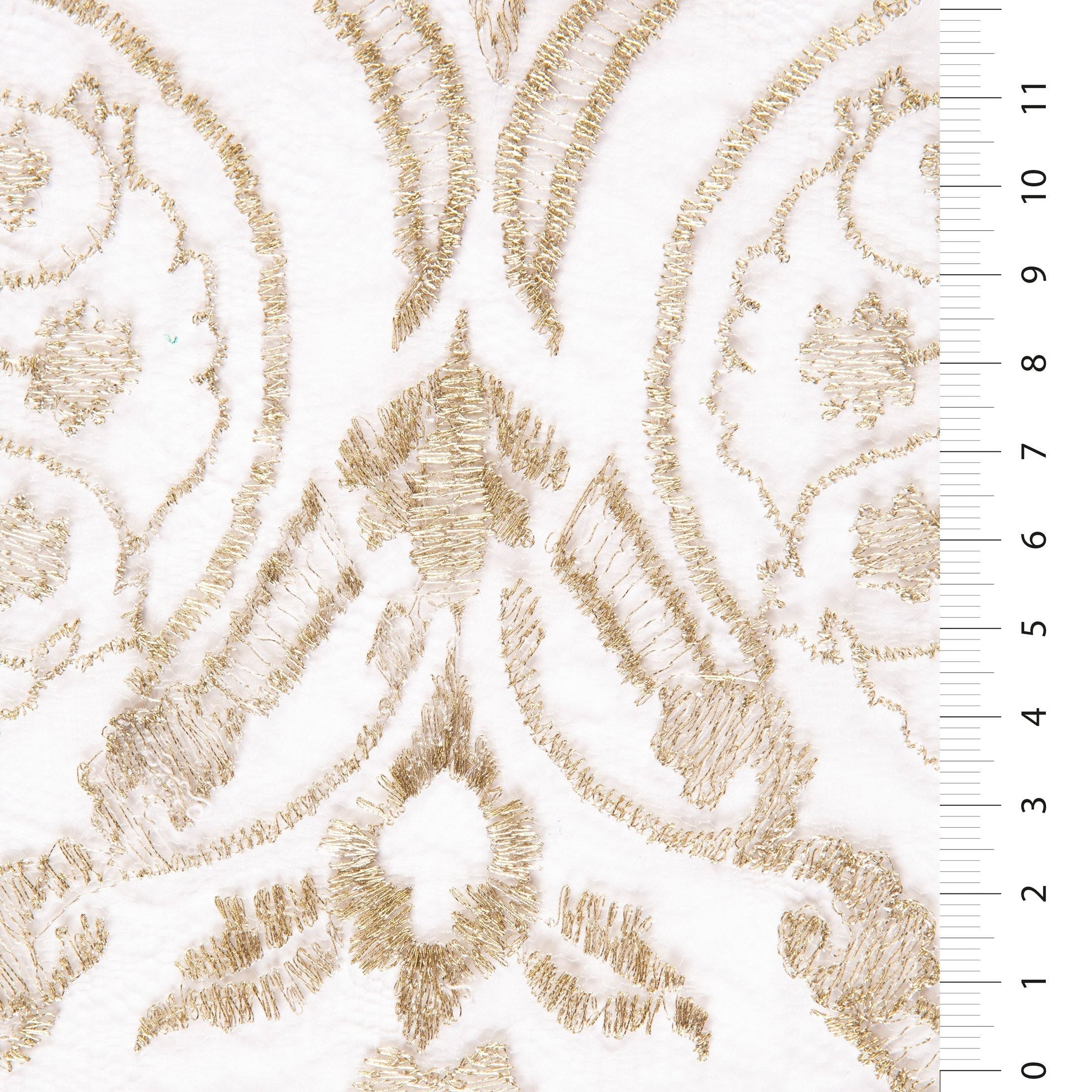 Symmetrical Embroidered Fabric with Decorative Embellishments