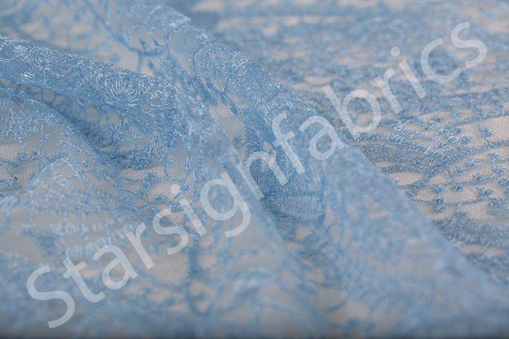 Shiny Lace Thread Embroidered Fabric with Far Eastern Style Oval Flower Design
