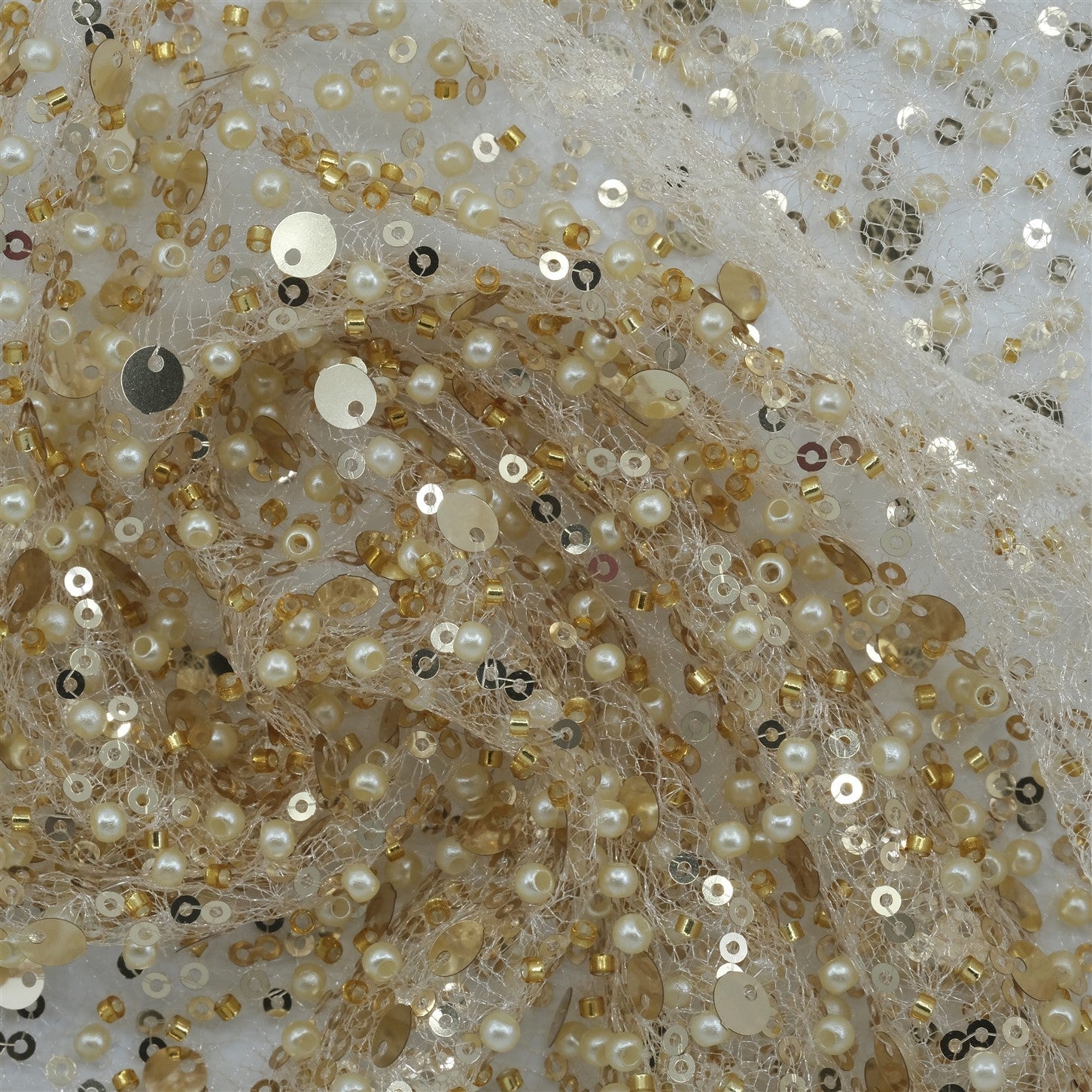 SPIDER NET TULLE FABRIC WITH SEQUINED PEARLS AND CUT BEADS